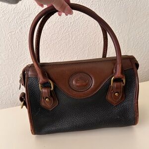 SOLD. Dooney & Bourke Black and Brown Leather Bag